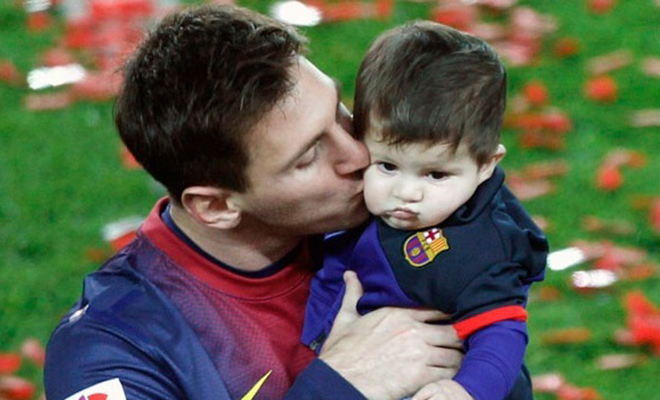 Lionel Messi with his son