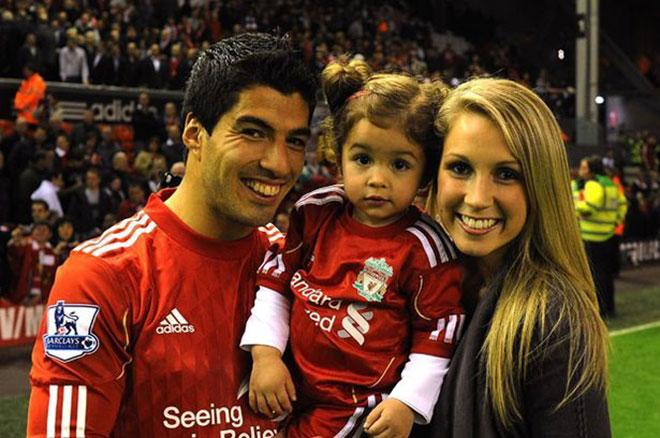 Luis Suarez and Sophie Balbi with their daughter