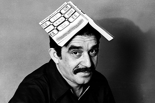 Gabriel García Márquez with a book