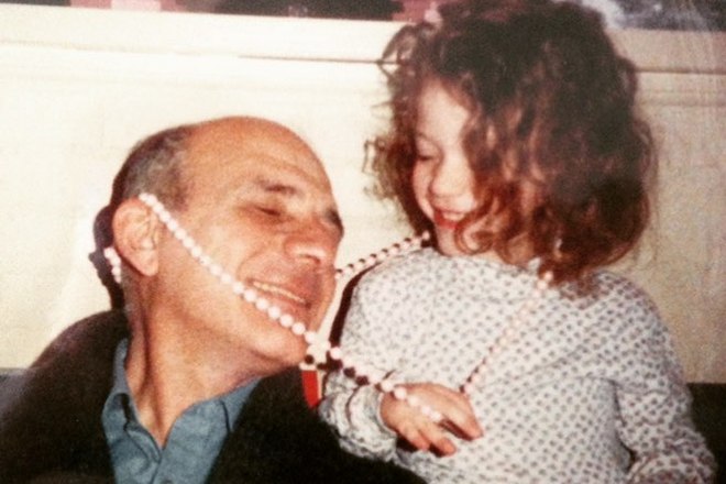 Small Kat Dennings with her father