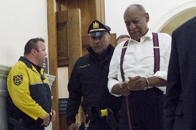 Bill Cosby being arrested