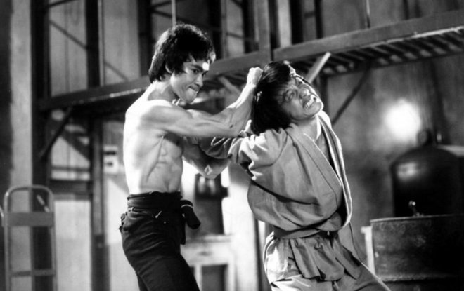Bruce Lee and Jackie Chan in the movie Enter the Dragon