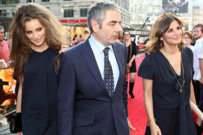 Rowan Atkinson with his wife and daughter