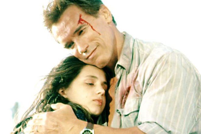 Arnold Schwarzenegger and Eliza Dushku in the movie True Lies