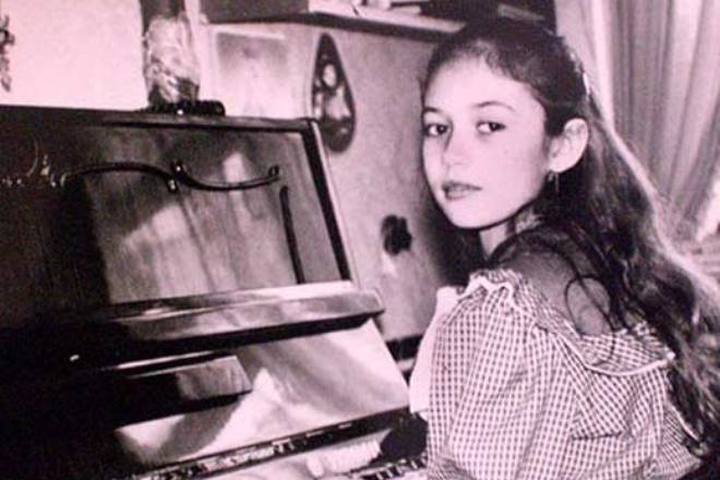 Olga Kurylenko in her childhood
