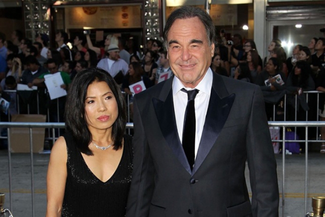 Oliver Stone with his wife Sun-Jung Jung