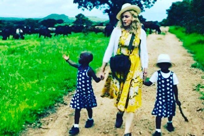 Madonna with her daughters Stella and Esther