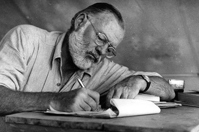 Ernest Hemingway is working