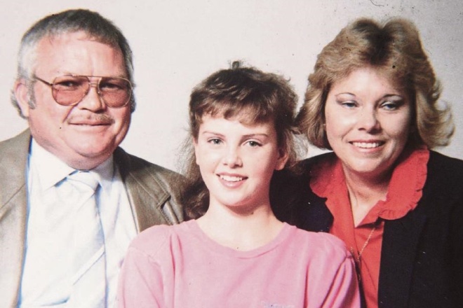 Charlize Theron as a child with her parents