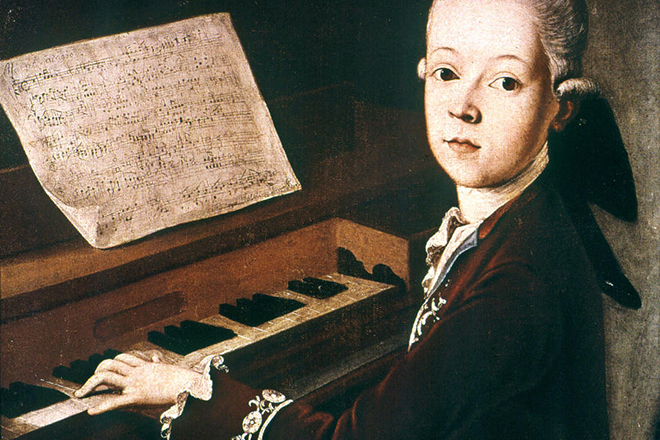 Young Wolfgang Mozart at the piano