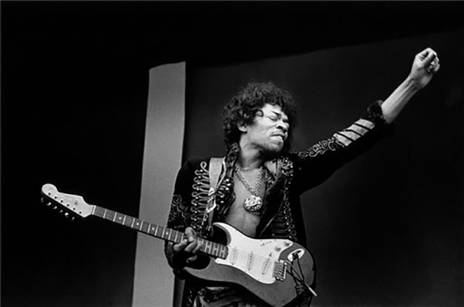 Jimi Hendrix with a guitar
