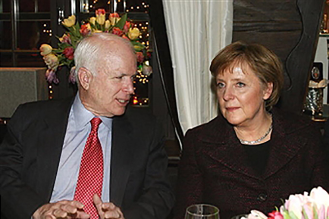 John McCain and Angela Merkel