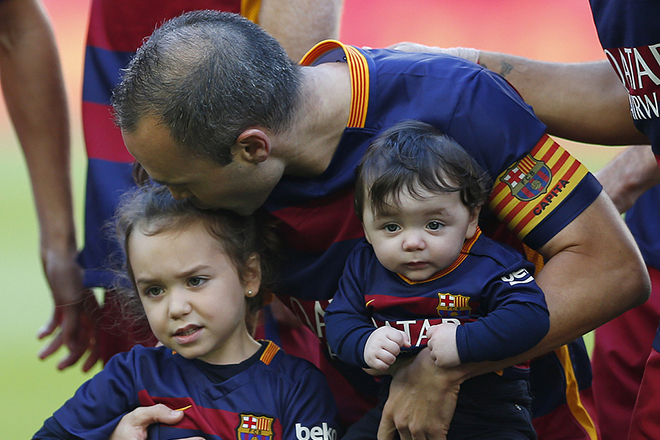 Andrés Iniesta with his children