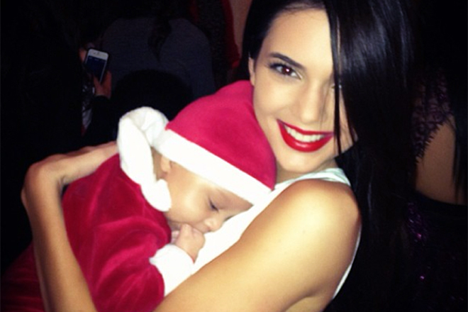 Kendall Jenner with a small child