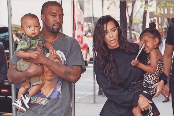 Kayne West with his wife and children