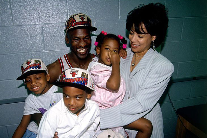 Michael Jordan with his first wife Juanita and the children