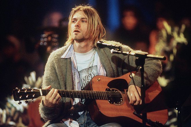 Kurt Cobain playing the guitar
