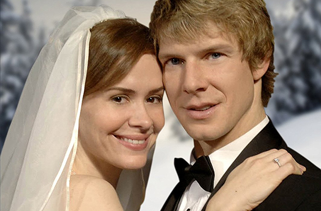 Sarah Paulson and Eric Mabius in the movie A Christmas Wedding