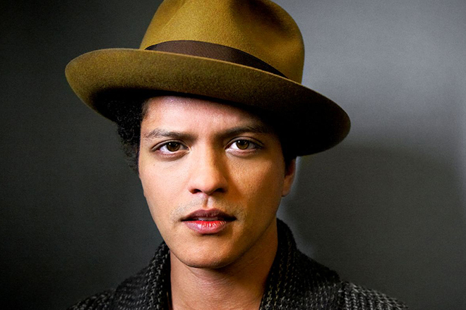 Bruno Mars wearing a hat