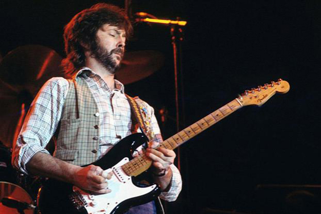 Eric Clapton playing the guitar