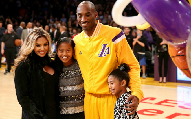 Kobe Bryant with his wife and children