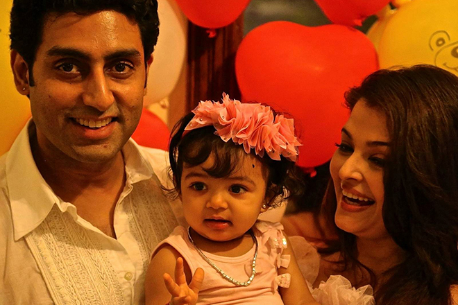 Abhishek Bachchan with his wife and daughter