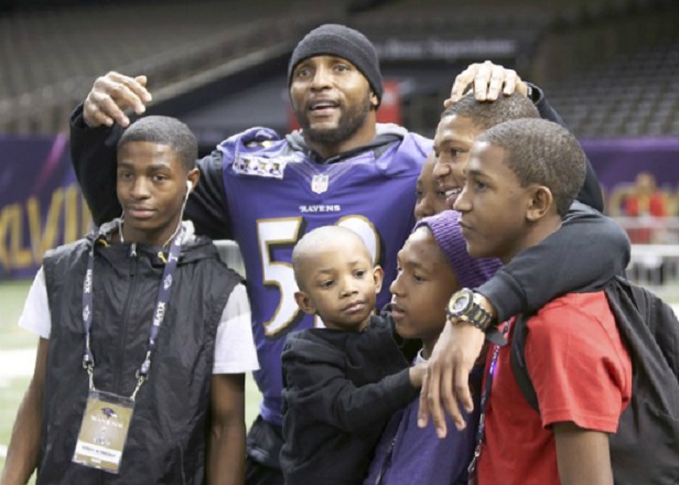 Ray Lewis with children