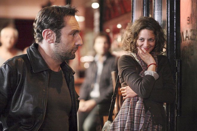 Gilles Lellouche and Marion Cotillard in the film Little White Lies