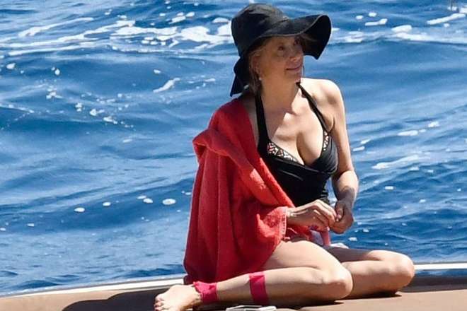 Mira Sorvino wearing a swimsuit