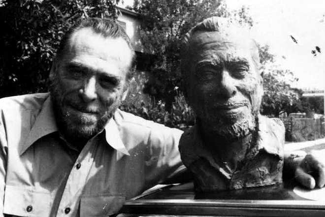 Charles Bukowski with his bust