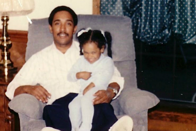 Little Candice Patton with her father