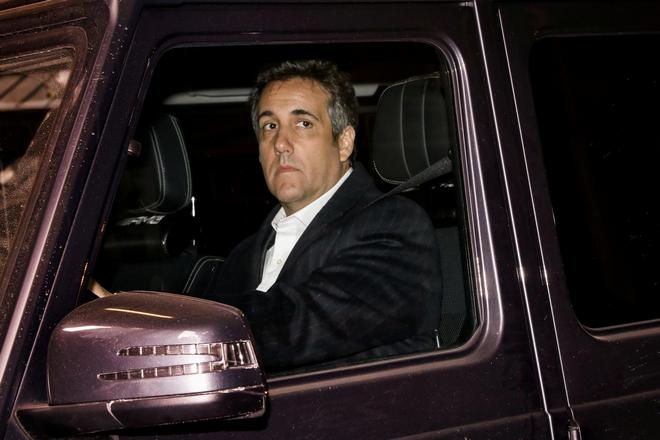 Michael Cohen behind the wheel of a car