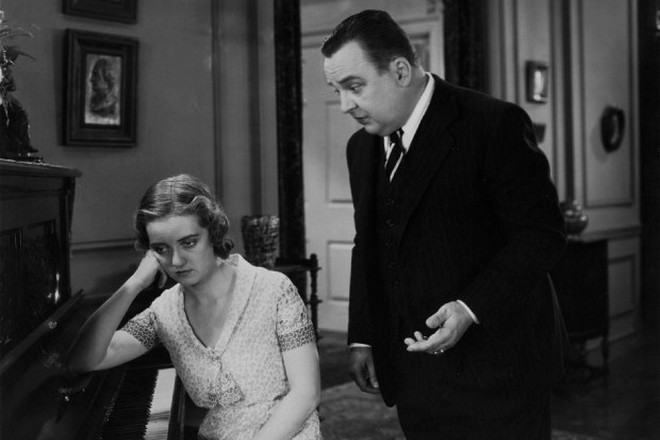 Bette Davis and Bert Roach in the movie Bad Sister