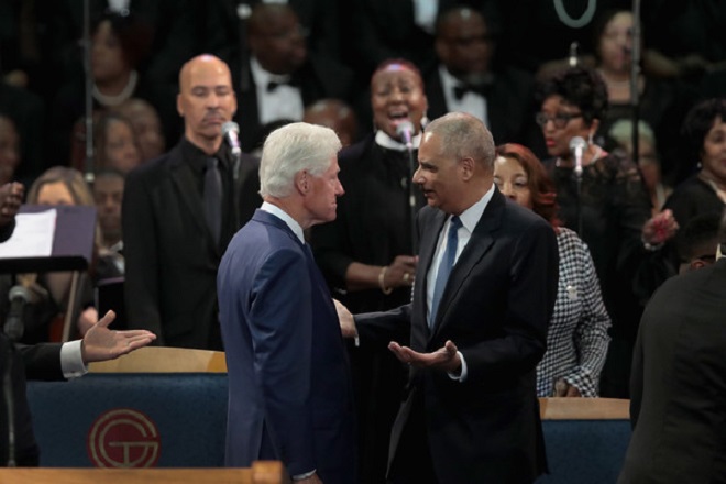 Bill Clinton and Eric Holder
