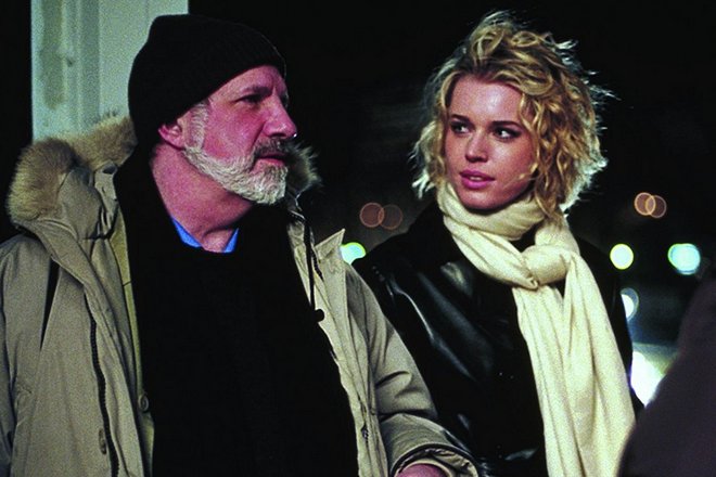 Brian De Palma and Rebecca Romijn on the set of the film Femme Fatale