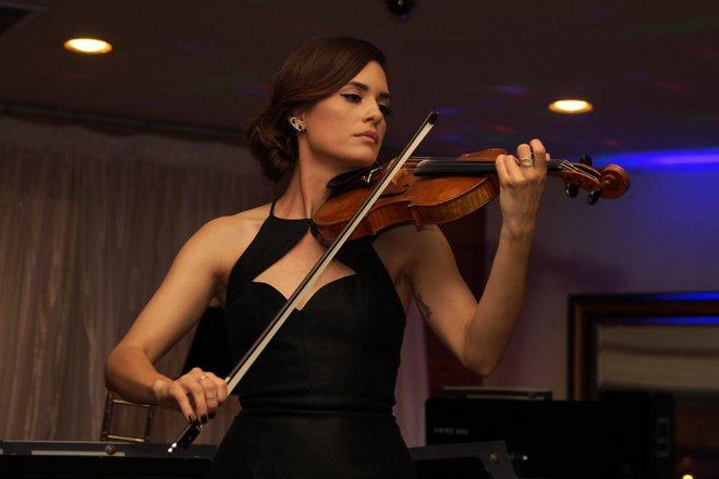 The violinist Torrey DeVitto