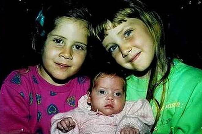 Chiara Ferragni as a child with her sisters