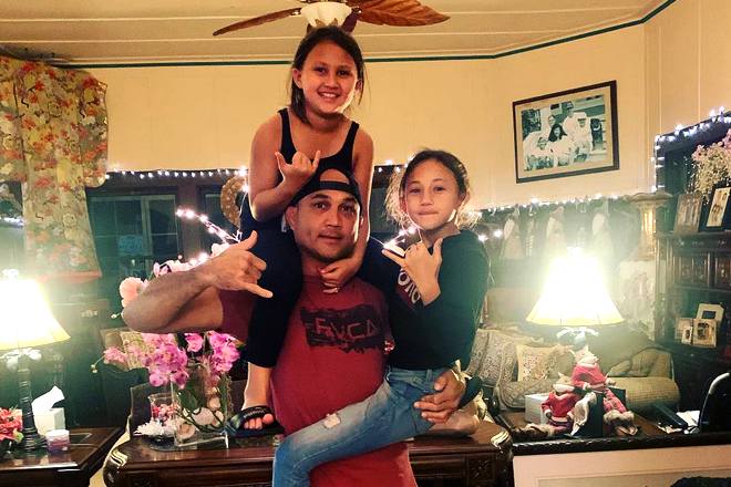 BJ. Penn in 2019 with his daughters