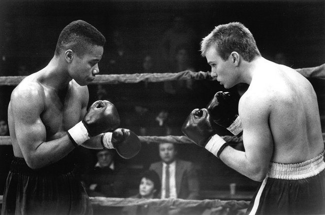 Cuba Gooding Jr. and James Marshall shoot in the film Gladiator