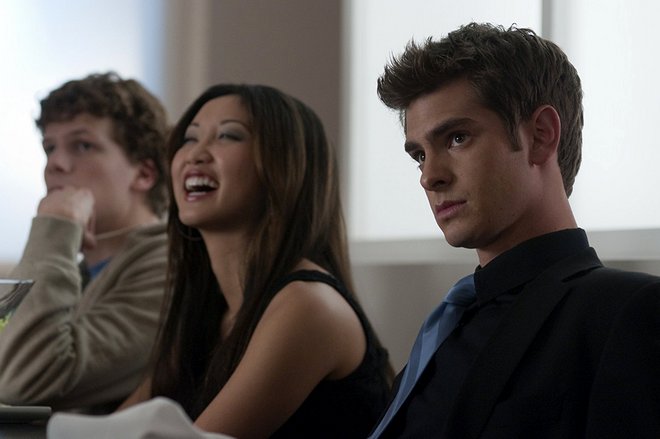 Jesse Eisenberg, Brenda Song, and Andrew Garfield in the movie The Social Network