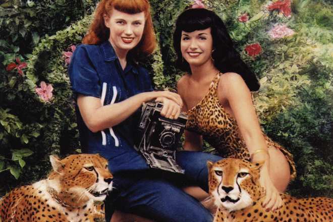 Bunny Yeager and Betty Page in a leopard swimsuit
