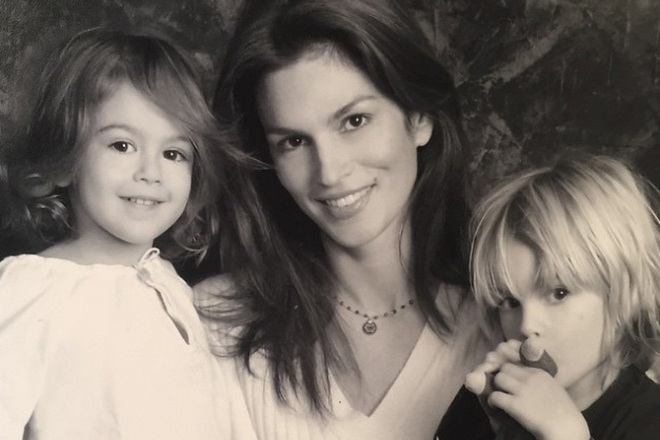 Kaia Gerber as a child with her mother and brother