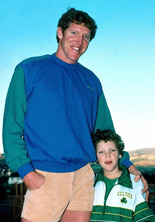Bill Walton (left) of the Boston Celtics poses with his son Luke in 1987 in Los Angeles.