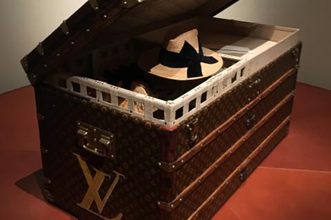 Louis Vuitton suitcase in a corporate color