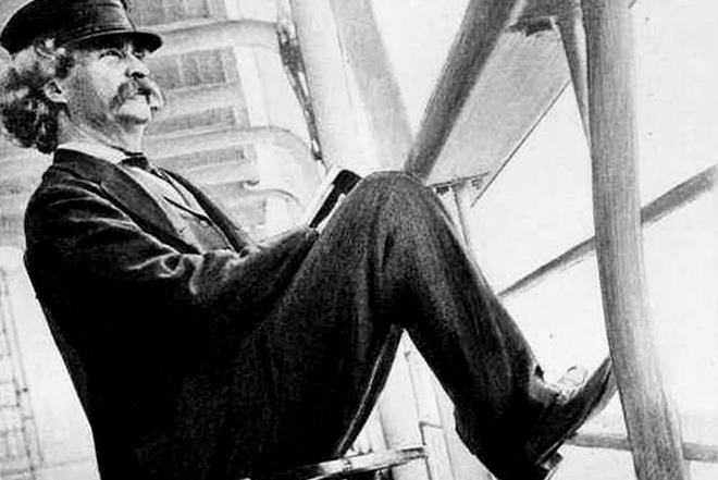 Mark Twain on the deck of a ship | RamWeb