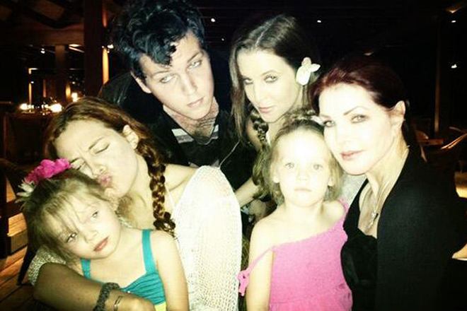 Lisa Marie Presley with her children