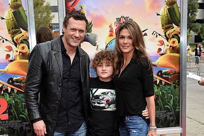 Paige Turco with her husband and son