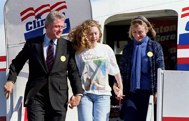 Bill Clinton with his wife and daughter