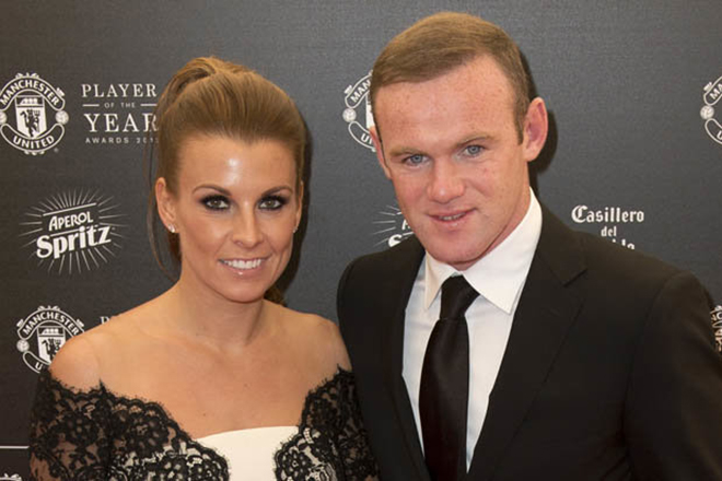 Wayne Rooney with his wife