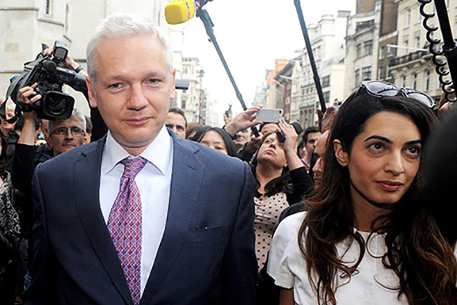 Amal Alamuddin and Julian Assange
